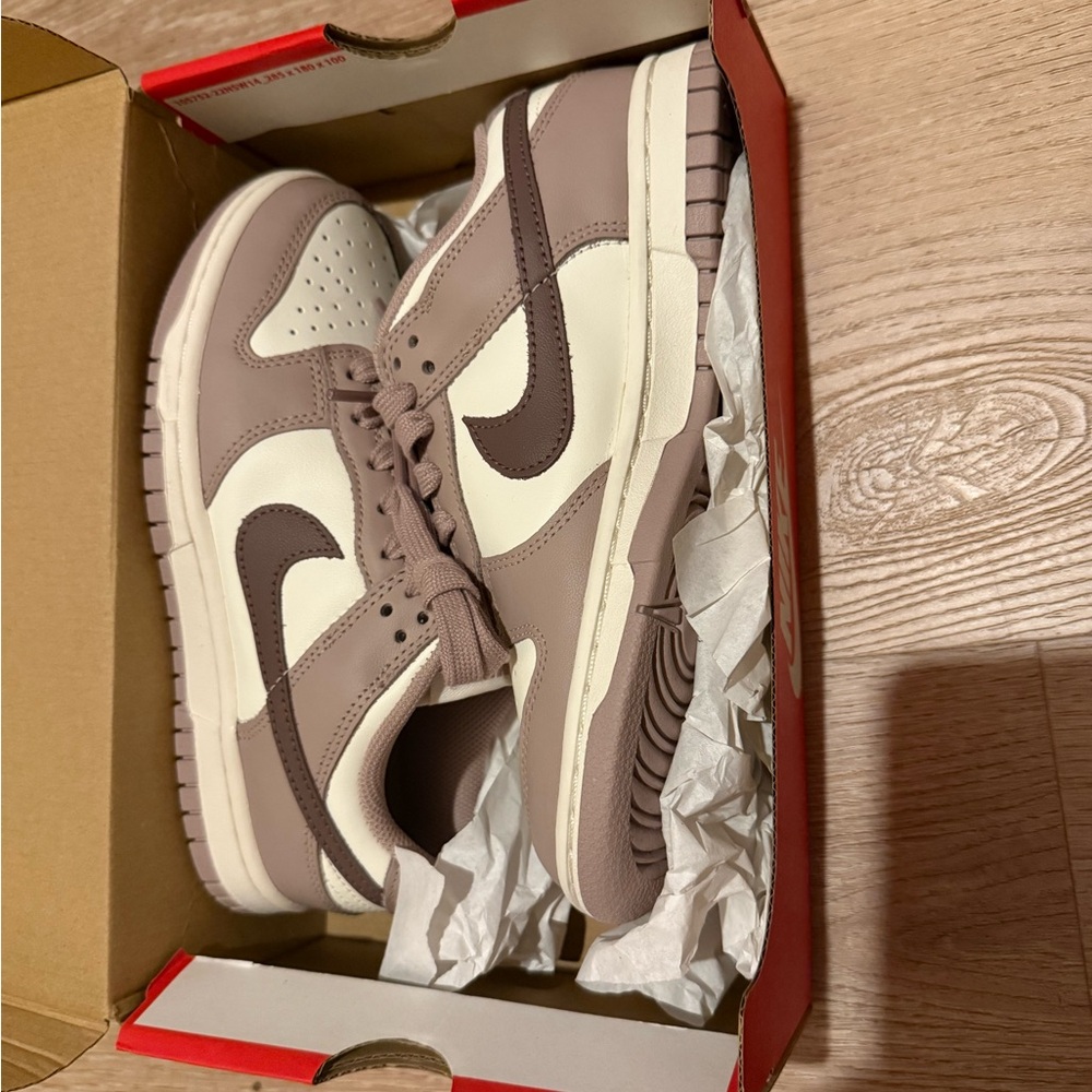 Nike women’s Taupe and White Sneakers